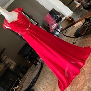Beautiful red evening gown for elegant evenings or prom.